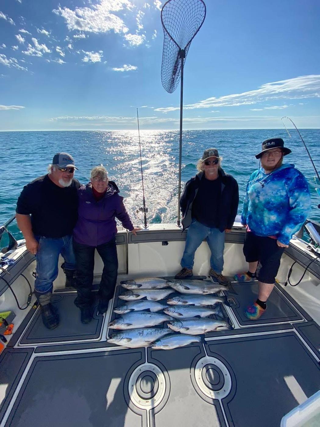 Captain Adam working the lines on Lake Michigan